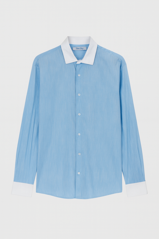 Puños blanco camisa azul