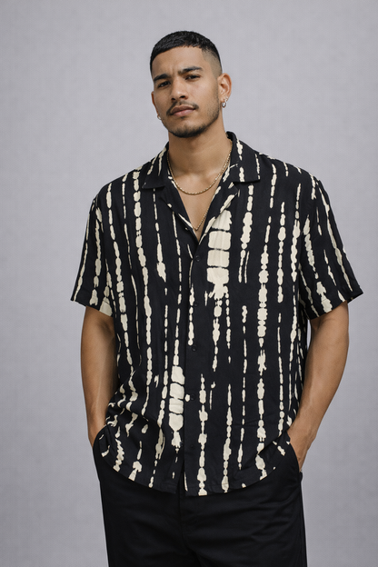 Camisa crema y negra arder